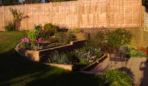 After - retaining walling and planted area