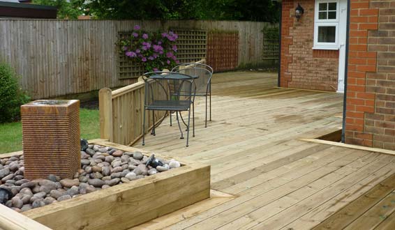 Stone water feature & raised decking